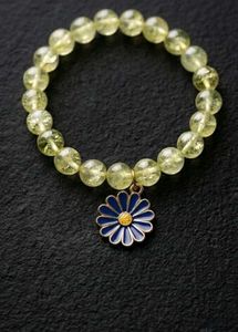 Yellow Beaded Bracelet with Daisy Charm