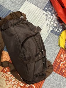 2 Clutches And 1 Handbag