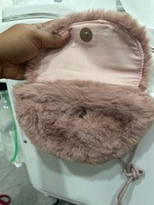 dusty pink furry sling bag