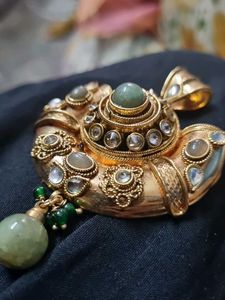 Designer Gold Tone Pendant with Green Stones