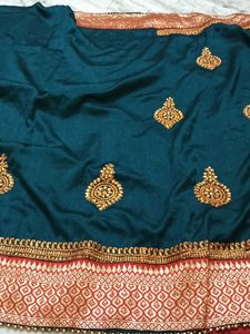 Elegant Teal Embroidered Saree