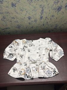 Floral Peplum Blouse with Embellished Waist