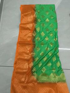 Vibrant Orange &amp; parrot Embroidered Lehenga Choli