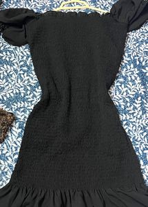 Black Off-Shoulder Smocked Mini Dress