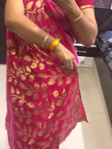 Elegant Pink Saree with Golden Motifs