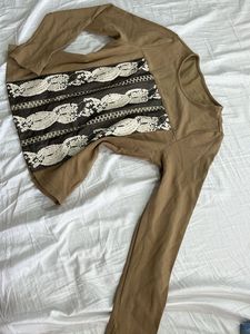 Brown long sleeve top with embroidered detail