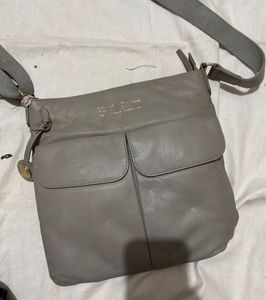👜 Pure Luxuries London Crossbody Bag – Light Blue