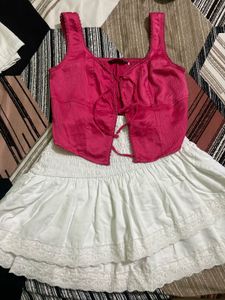 Chic Pink Lace-Up Crop Top with white skirt