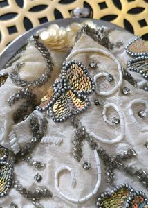 Beaded Clutch with Tassel Fringe