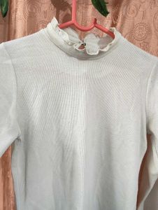 Ruffled Mock Neck Long Sleeve Top