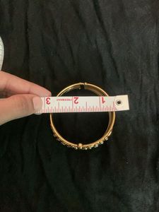Elegant Gold Tone Bangles with Stones