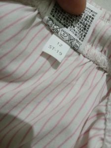 🎀 Uniqlo Pink and white stripped bottom wear