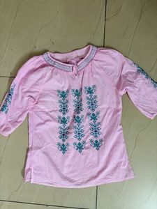 Elegant Pink Kurta with Intricate Embroidery
