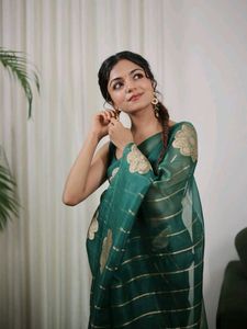 Elegant Green Saree with Floral Motifs