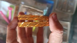 Set of 4 Gold Tone Bangles