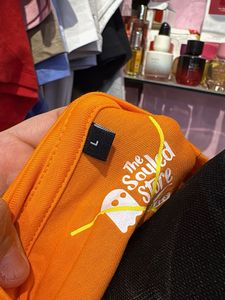 Orange Cut-Out Long Sleeve Top