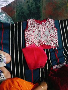 Elegant Red Lehenga Choli with Intricate Embroider
