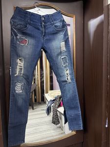 Distressed Patchwork Denim Jeans