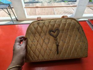 Quilted Beaded Handbag with Heart Charm