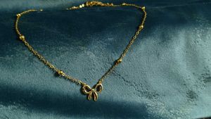 Delicate Gold Bow Necklace