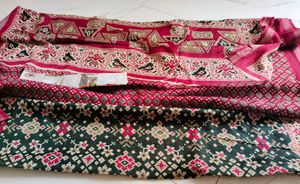 Elegant Dark Saree with Traditional Print
