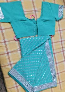 Stunning Teal Sequined Saree with Blouse