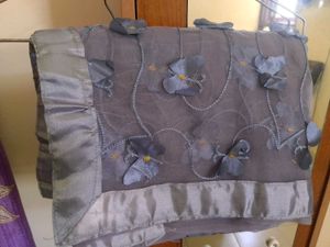 Gray net saree with butterfly patch work.