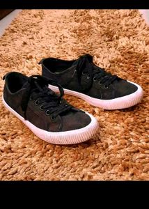 Black Canvas Sneakers available in coins