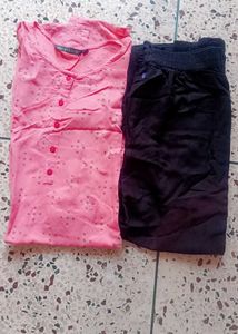 Stylish Peach Printed Kurta with Black plazo.