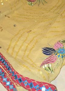 Elegant Yellow Embroidered Saree With Mirror work.