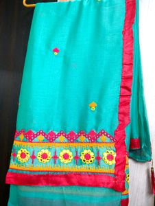 Beautiful Teal Saree with Pink Border