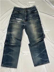 Distressed Blue Denim Jeans