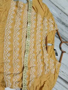 Yellow Embroidered Peplum Top