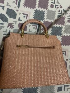 Chic Pink Textured Handbag