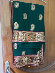 Heavy embroidered saree with Stitched blouse