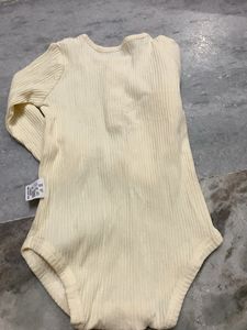 Cream Ribbed Long Sleeve Bodysuit