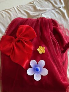 Stunning maroon mini frock with bow and clutches