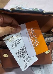 -Free Delivery -MK Sling Bag