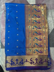 Vibrant Blue Silk Saree with Peacock Motif