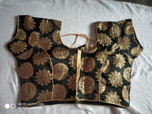 NEW Brocade black blouse.