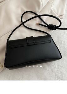 Chic Black Shoulder Bag with Charm
