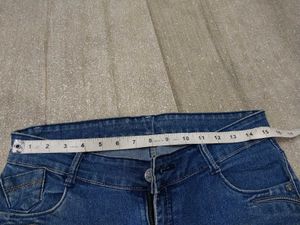 Distressed Blue Denim Jeans