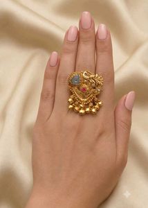 Exquisite Gold Toned Ring with Bells