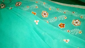 Beautiful Teal Saree with Embellished Border