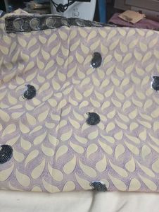 used Elegant net Sequined Saree.without blouse