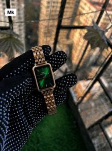 Elegant Rose Gold Watch with Green Dial