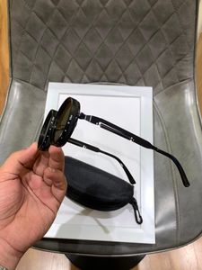 Round Black Sunglasses with Case