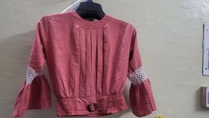 Elegant Pink Bell Sleeve Blouse with Lace Detail