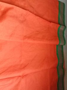 Vibrant Orange Saree with Embellished Blouse