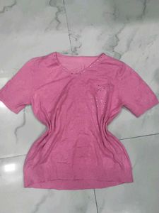 a beautiful V-neck Pink top with deads